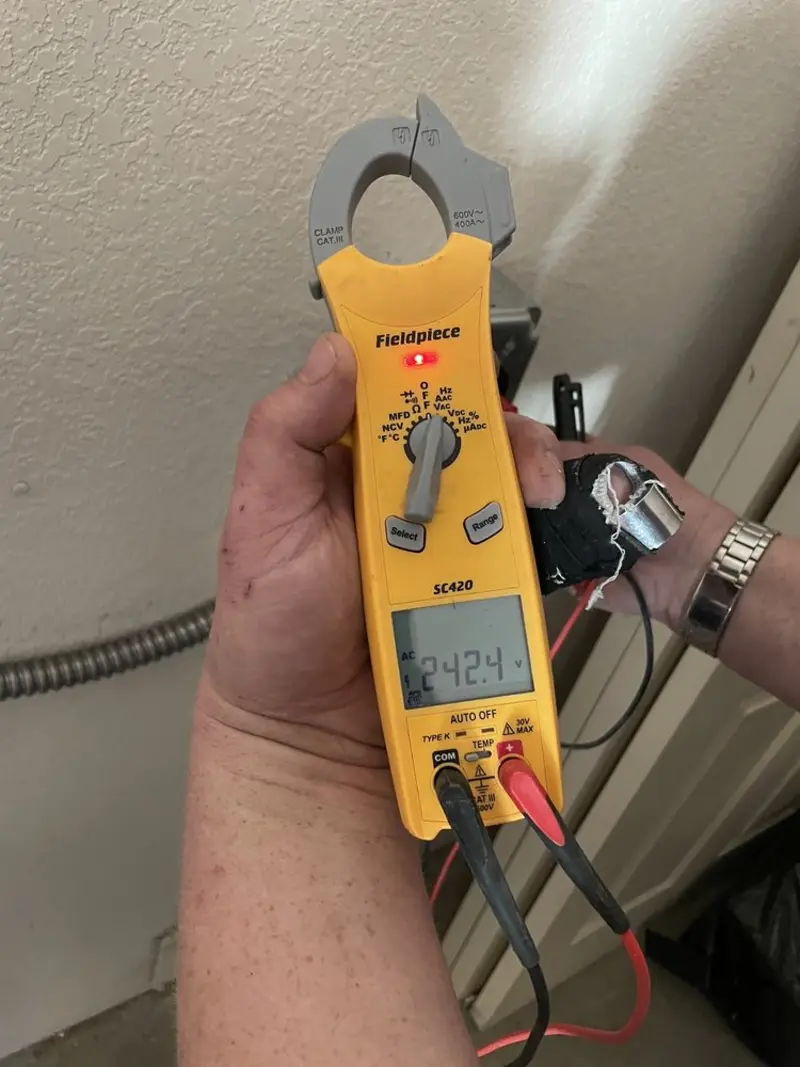 Voltage testing with clamp meter during Circuit Breaker Repair in Creedmoor